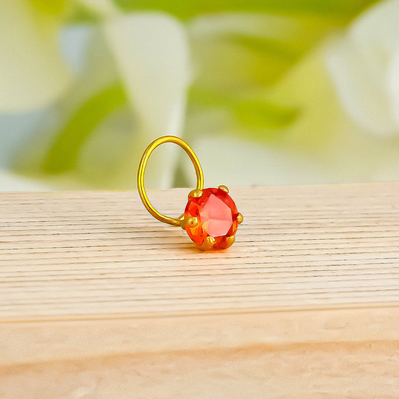 Gold Polish Nosepin with Red Stone