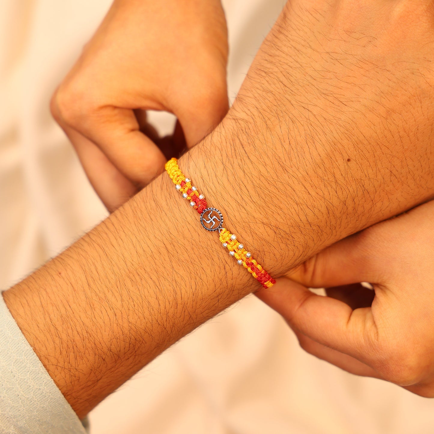 Shubh Swastik Silver Rakhi