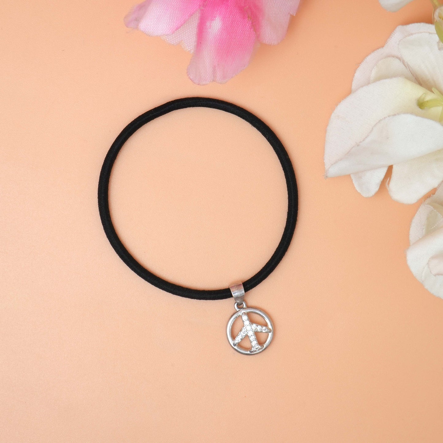 A Bracelet with a peace sign charm