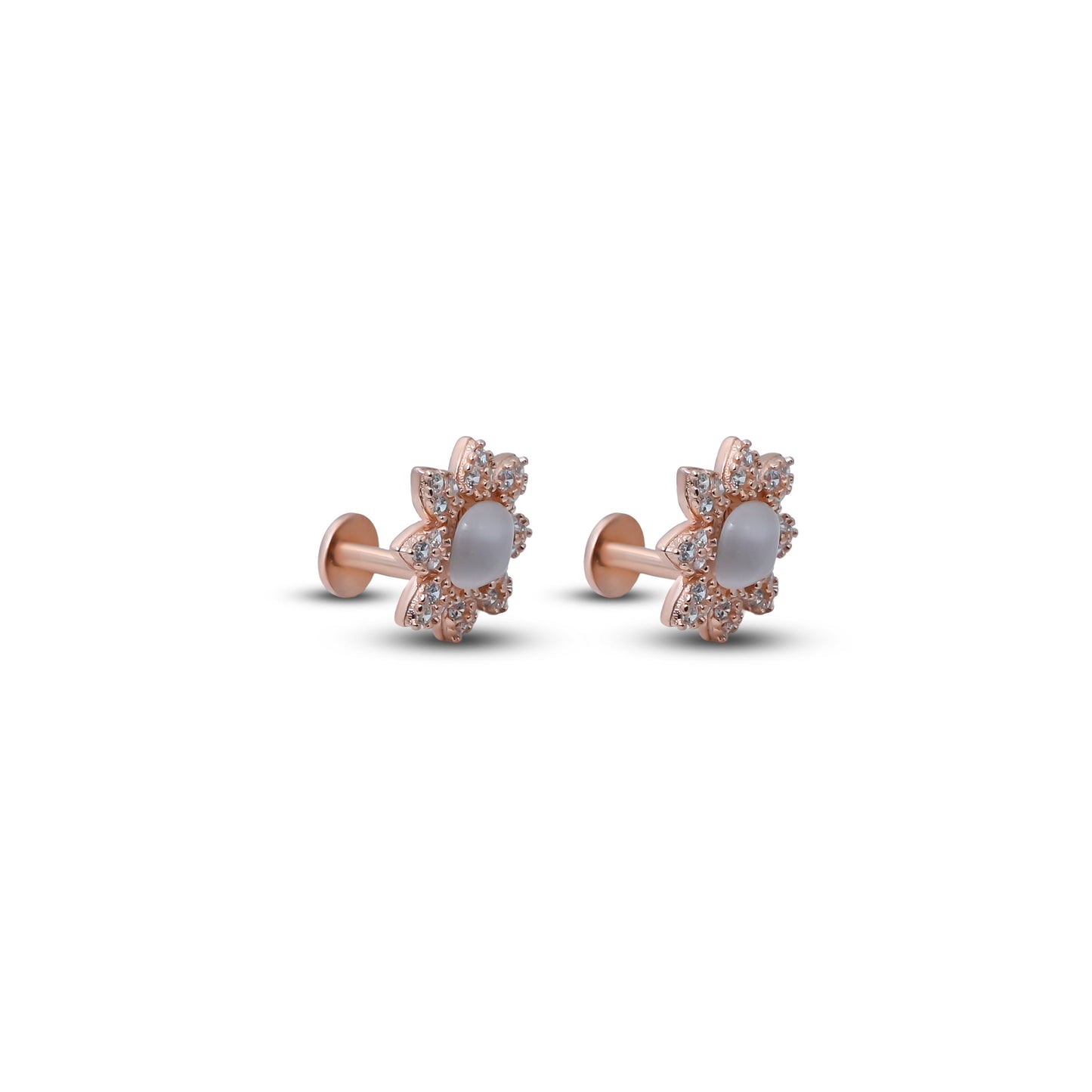 Elegant silver flower-shaped earrings featuring a pearl in the middle