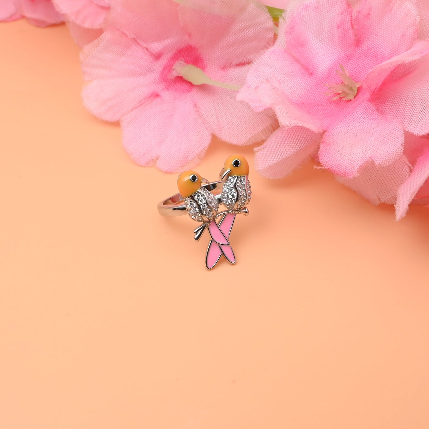 Romantic Silver Ring with Two Birds With Pink Tail, Symbolizing Love & Togetherness.