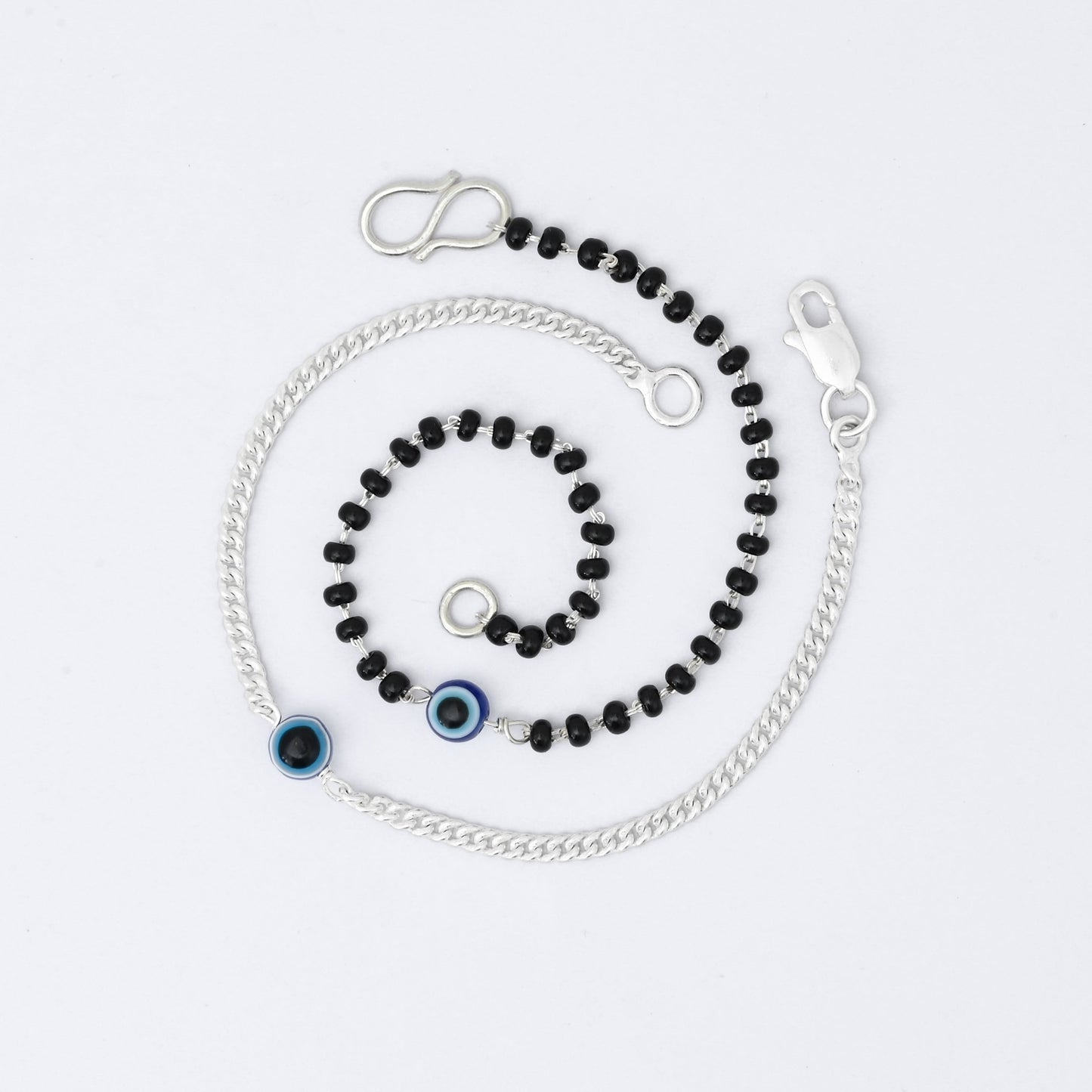 Elegant silver evil eye bracelet set for couples, stylish and protective.