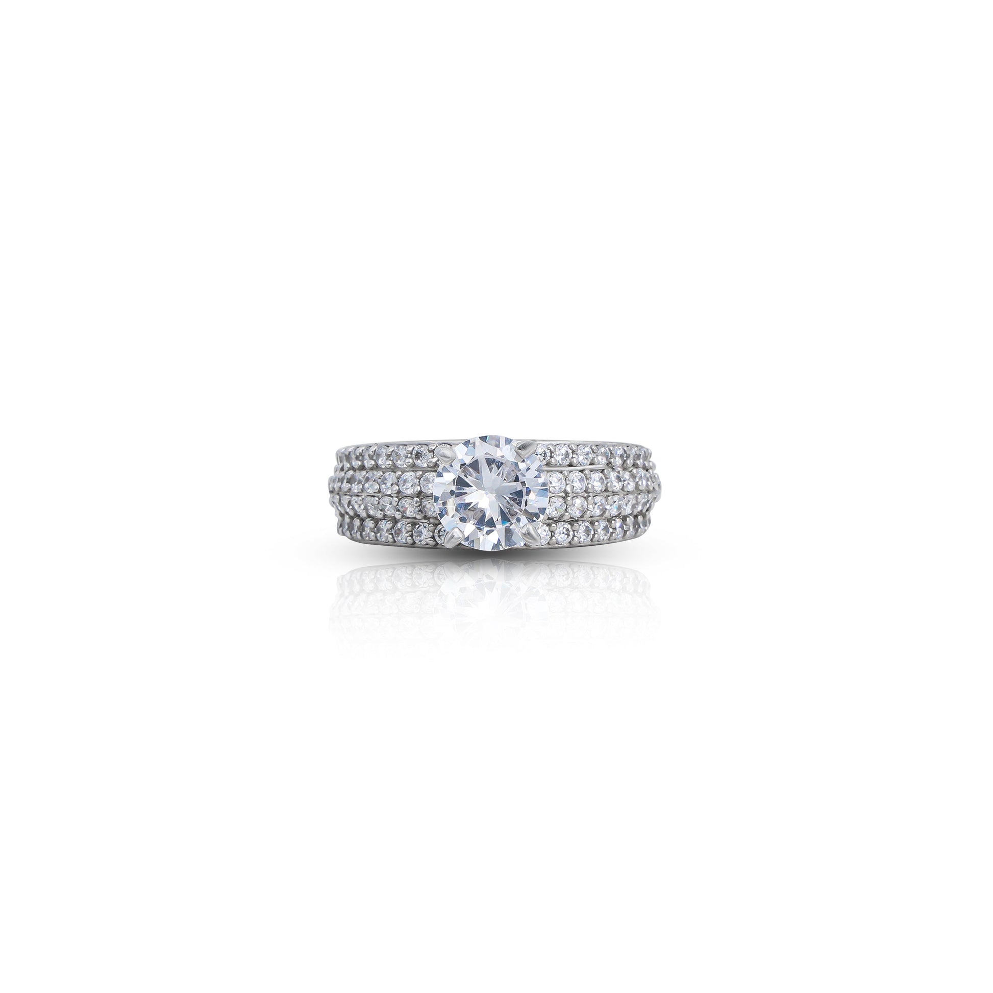 Elegant silver ring featuring a large white stone as the centerpiece.