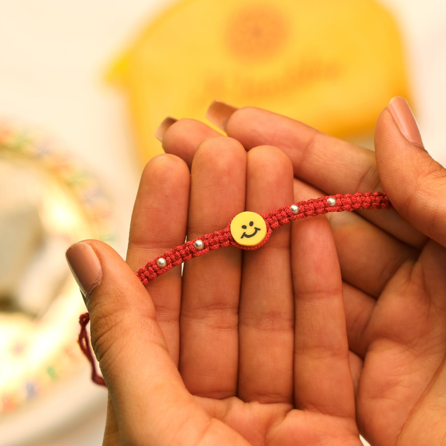 Joyful Smiley Rakhi in Silver